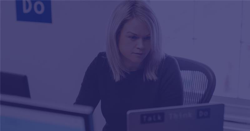 Scales of justice overlaid with code syntax representing UK AI intellectual property law